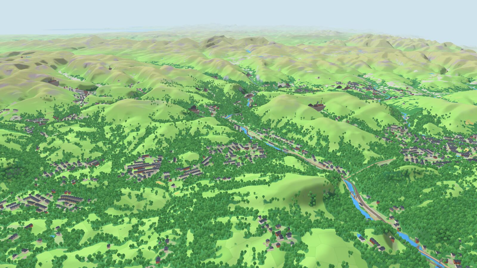 A view down the Taff valley in the game: wooded hills, terraced towns and a railway beside the river.